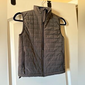 Properly tied gray vest